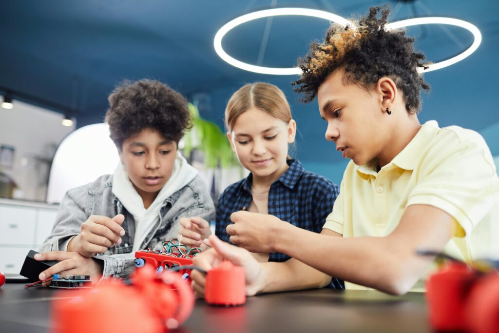 Young Students Doing Robotics Together Photo by Vanessa Loring: https://www.pexels.com/photo/young-students-doing-robotics-together-7869041/