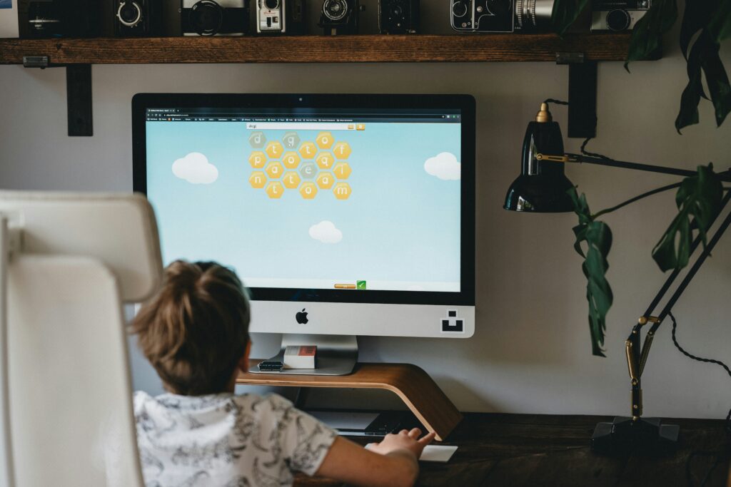 Child on computer playing an online game