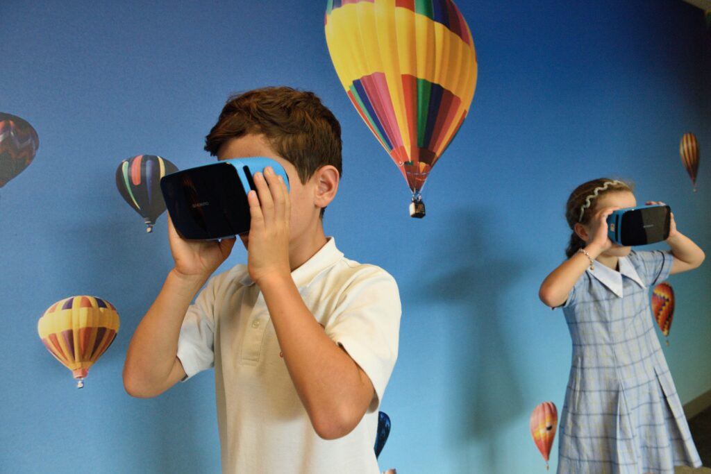 Boy using VR glasses.